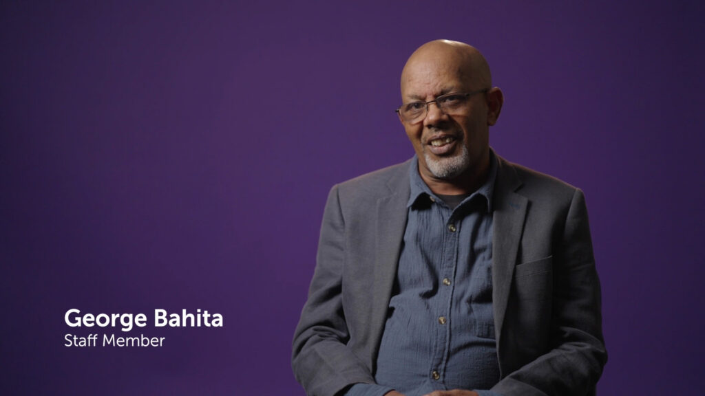 Picture from video about working for Alkira. Still frame shows Alkira longstanding employee George Bahita.