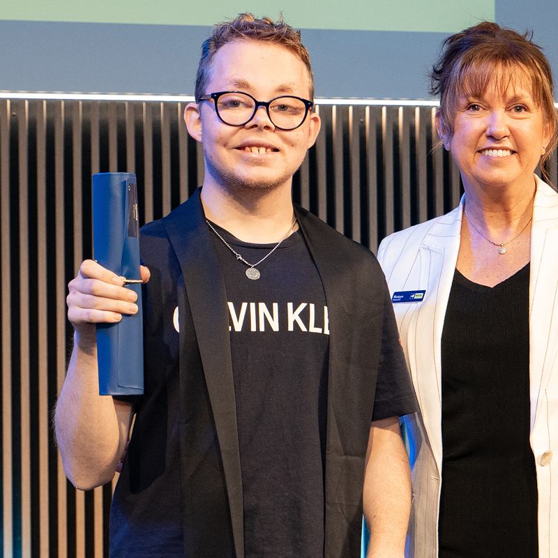 Alkira participant Joshua graduating from his TAFE course as a part of the Momentum program.