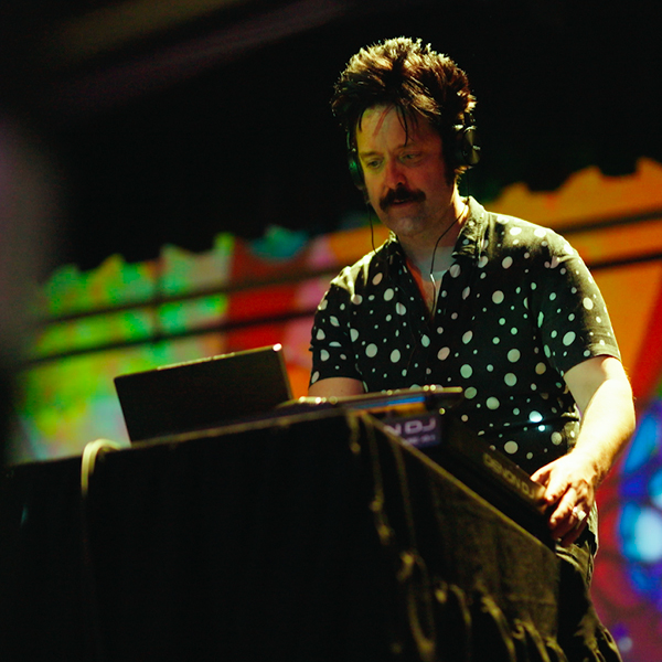 DJ and MC on stage at the Alkira 70th anniversary gala.